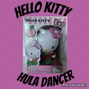 New Hello Kitty Hula Dancing Figure -Pink and Green. Batteries will be included.